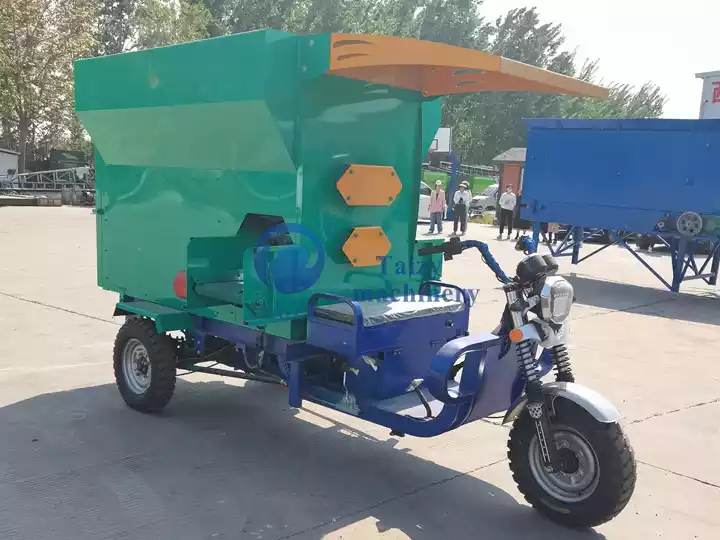automatic animal feed spreader